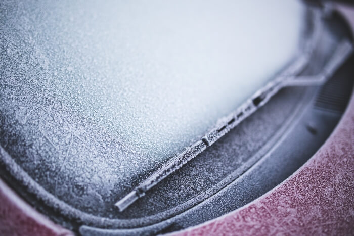 A frozen window of a passenger car